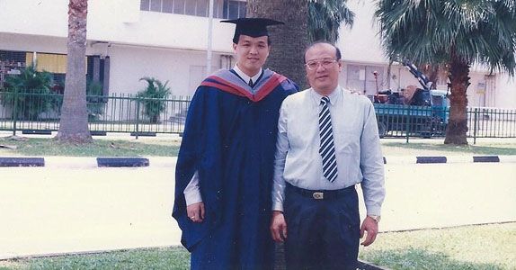 Mr Heng (with his father) learnt the value of honesty and hard work from his parents