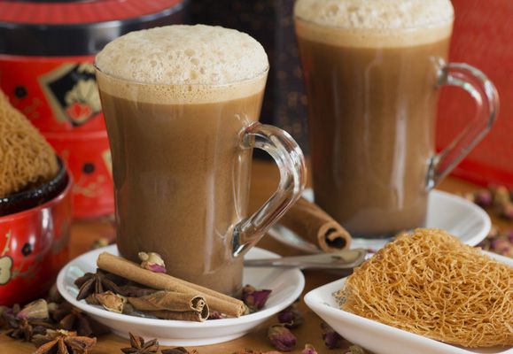 Teh tarik was introduced to Malaya by Indian-Muslim migrants who prepared the drink by pouring it back and forth between two containers