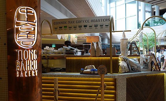 Enjoy freshly baked bread and a hot cup of coffee at Tiong Bahru Bakery's Raffles City outlet.